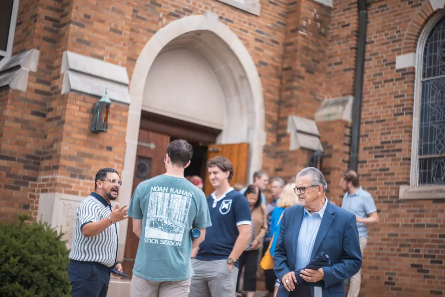 Conversation outside University Lutheran Chapel